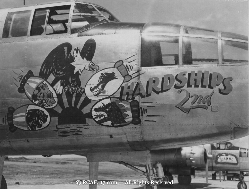 Nose art for the B-25 Hardships 2nd, an eagle attacking three bombs painted with enemy caricatures