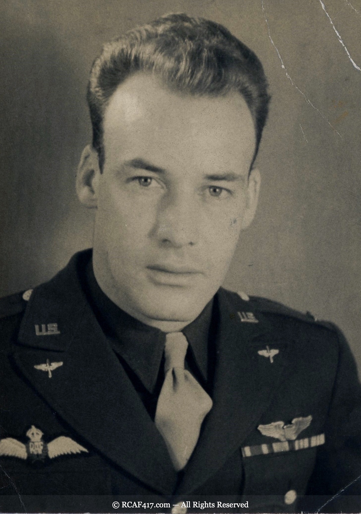 1st Lieutenant John Francis Koplitz in US Army Air Forces uniform, wearing both RCAF and USAAF pilot wings